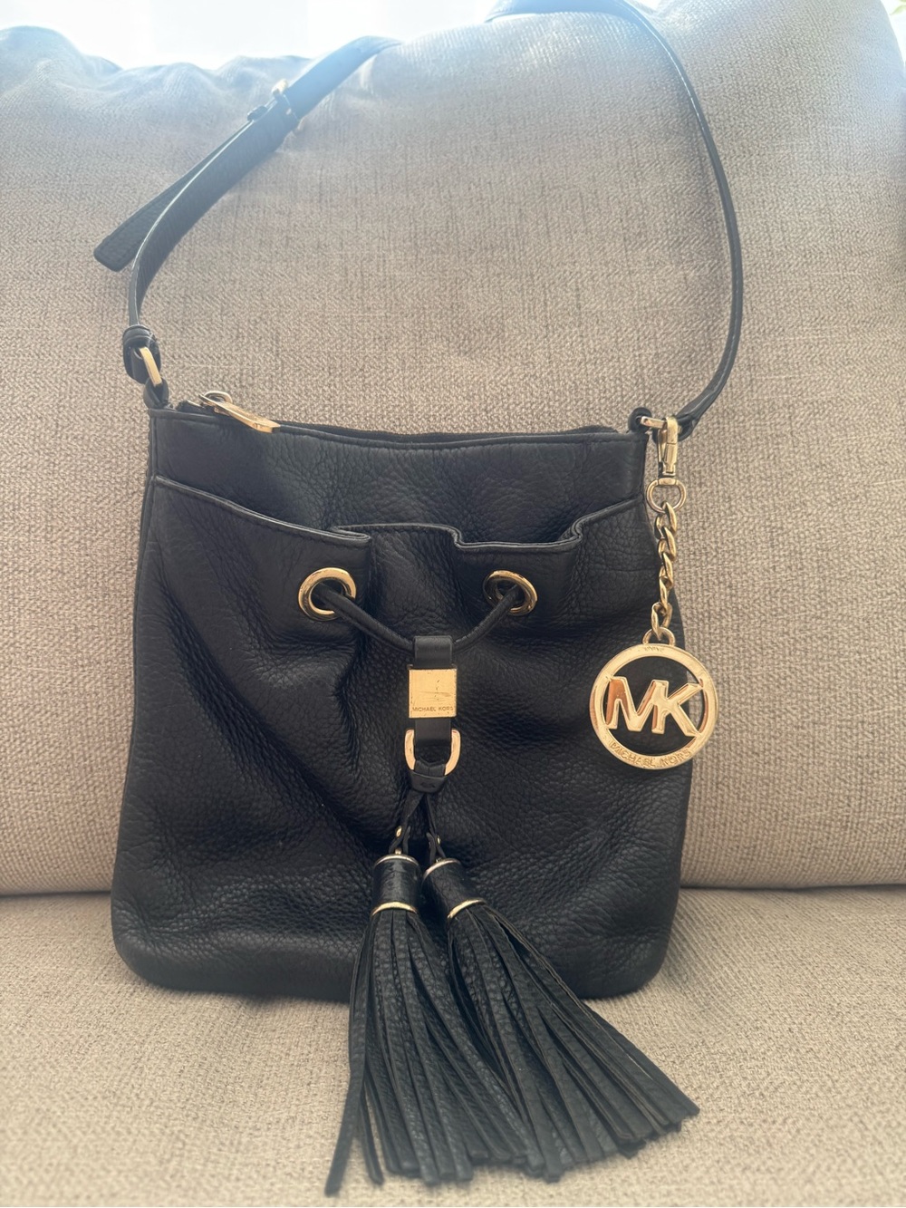 Michael Kors Black Leather Tassel Drawstring Crossbody with Gold MK Charm